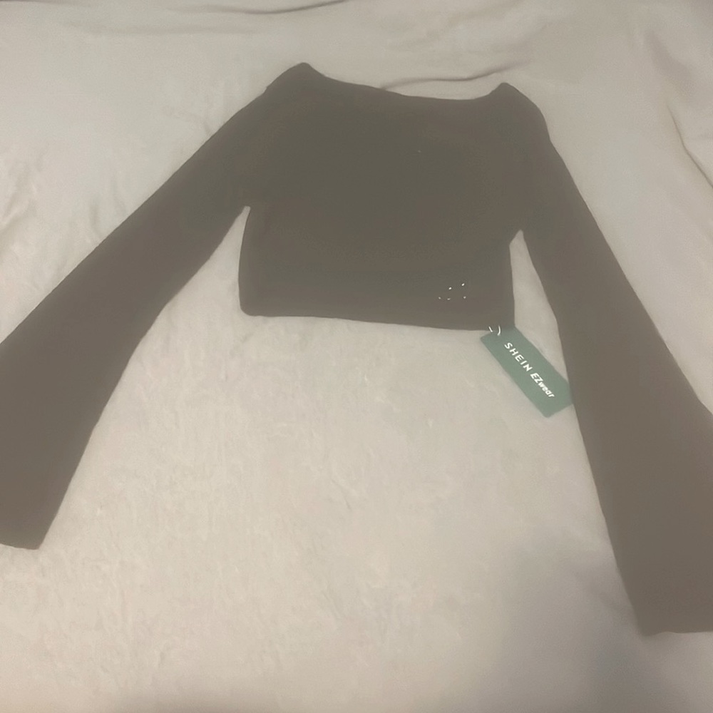 Flared black long sleeve shirt. XS in women’s